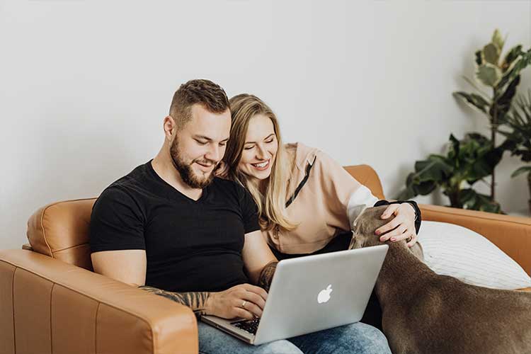 a couple on a laptop